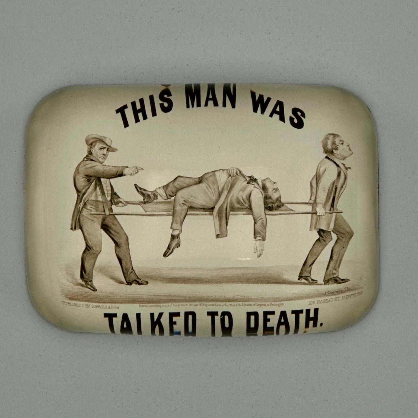 This man was talked to death square paperweight