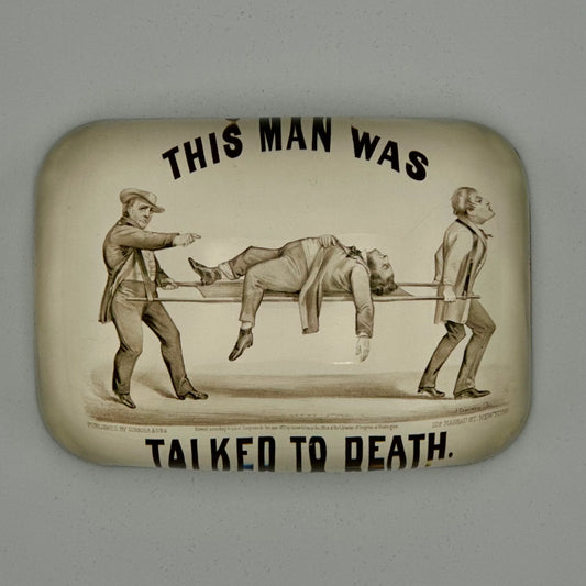 This man was talked to death square paperweight